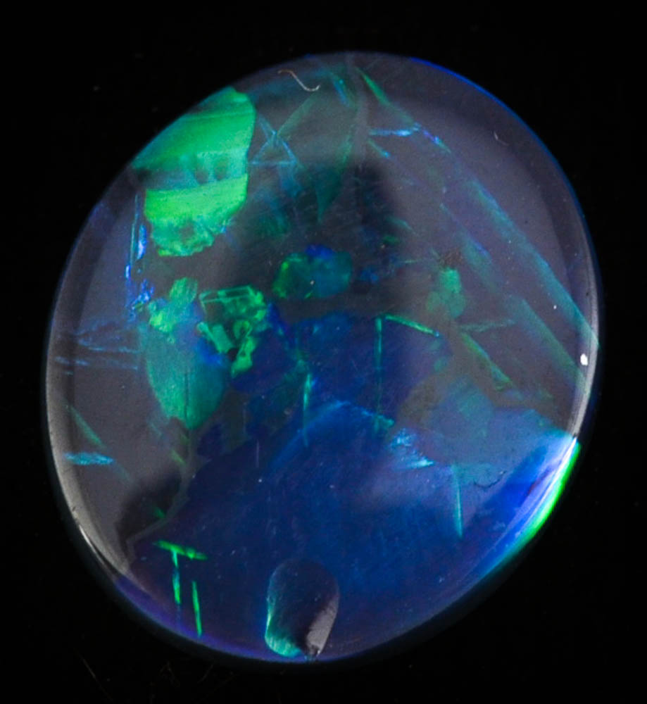 Loose 2.64 Carat Natural Black Boulder Opal Cabochon and Three Polished Stone Pendants