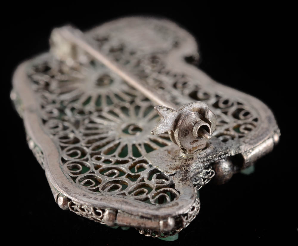 Early 20th Century Chinese Export 800 Silver and Carved Jadeite Filigree Pin Depicting a Chinese Guardian Lion