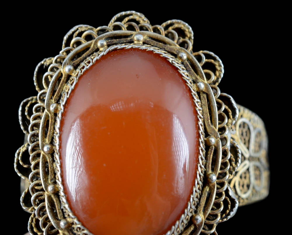 Early 20th Century Chinese Export 900 Silver and Carved Carnelian Filigree Ring and Screw Back Earrings