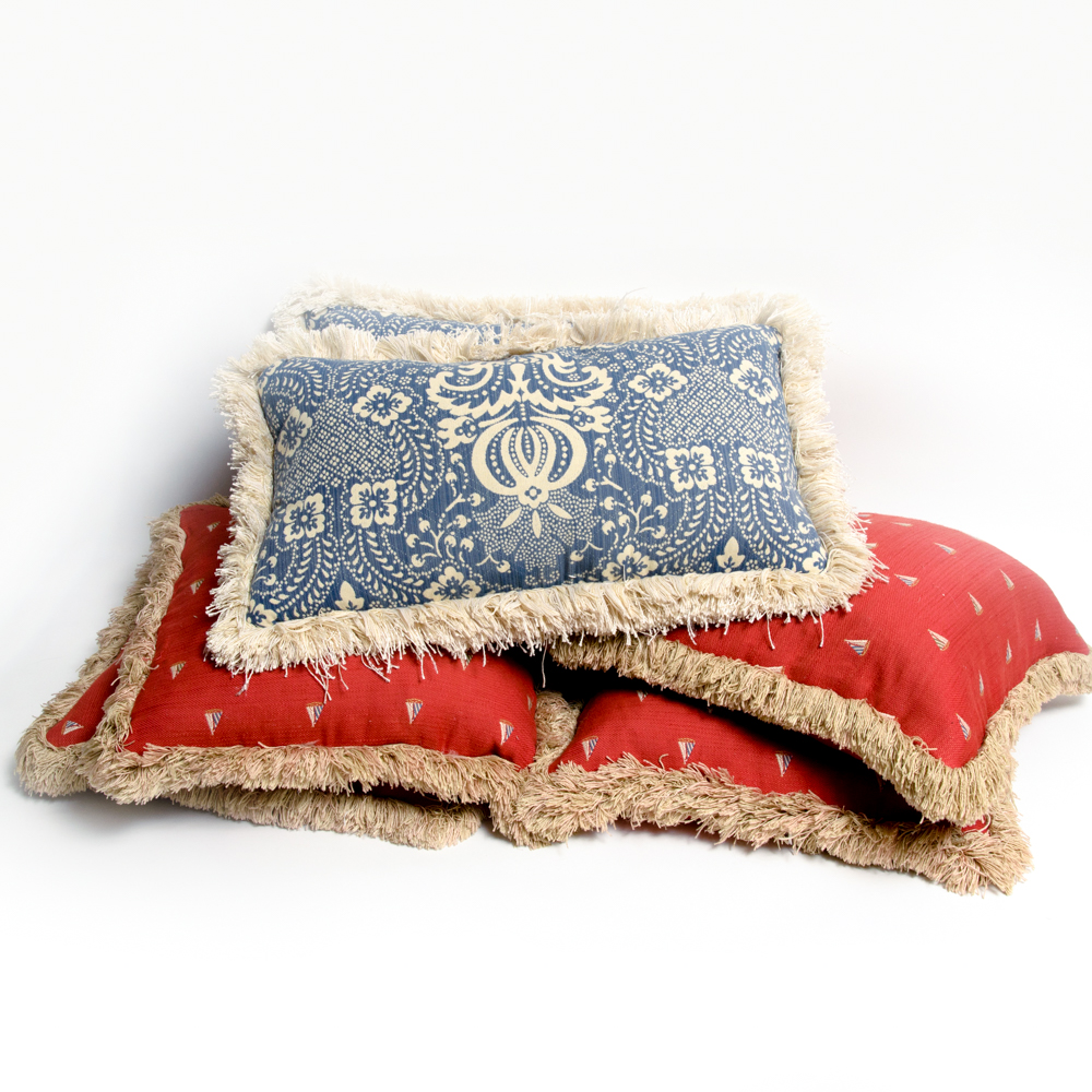 Collection of Assorted Red and Blue Pillows