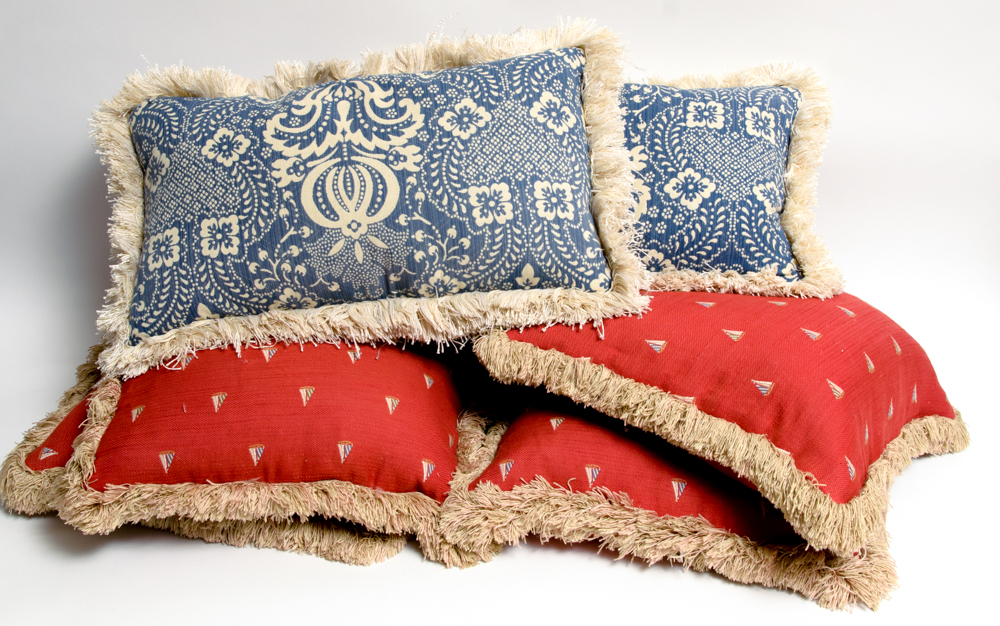 Collection of Assorted Red and Blue Pillows