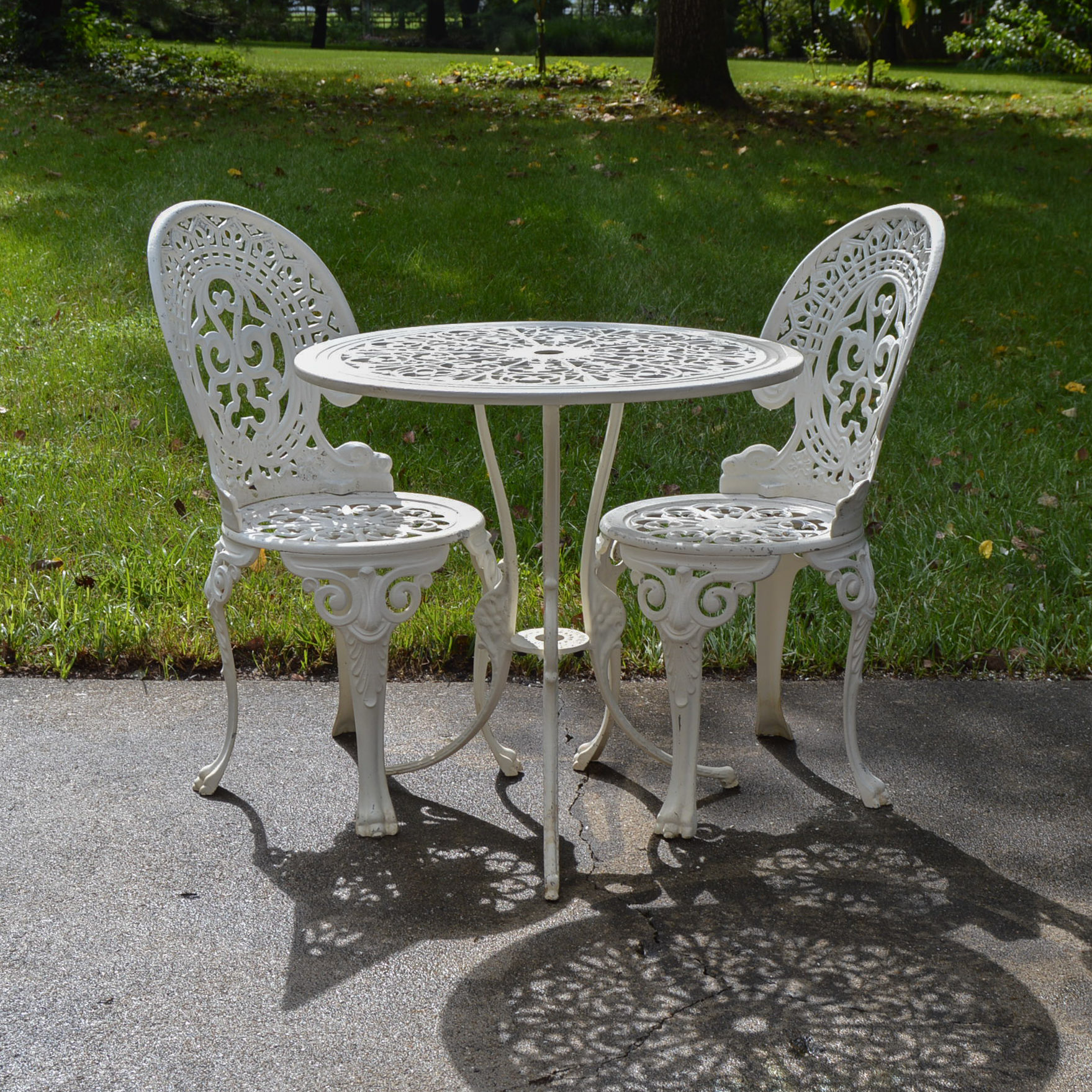 White Cast Iron Patio Table and Chairs