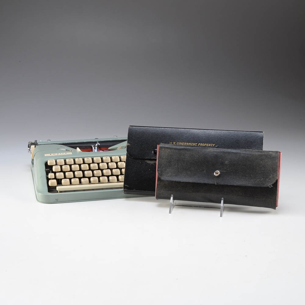 A Vintage "Empire" Typewriter and Drafting Tool Kits