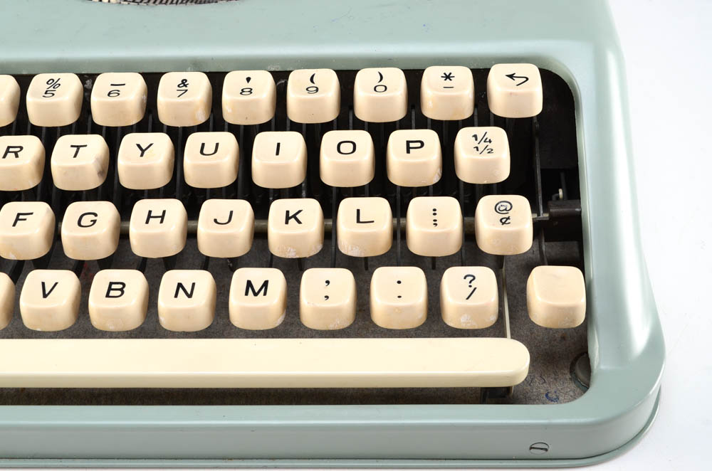 A Vintage "Empire" Typewriter and Drafting Tool Kits