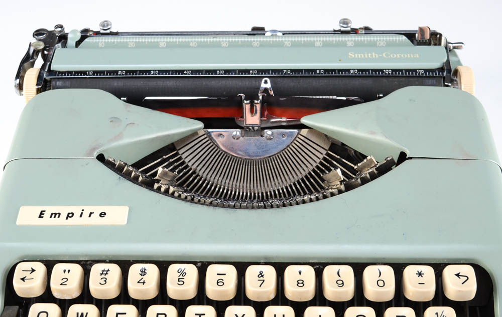 A Vintage "Empire" Typewriter and Drafting Tool Kits