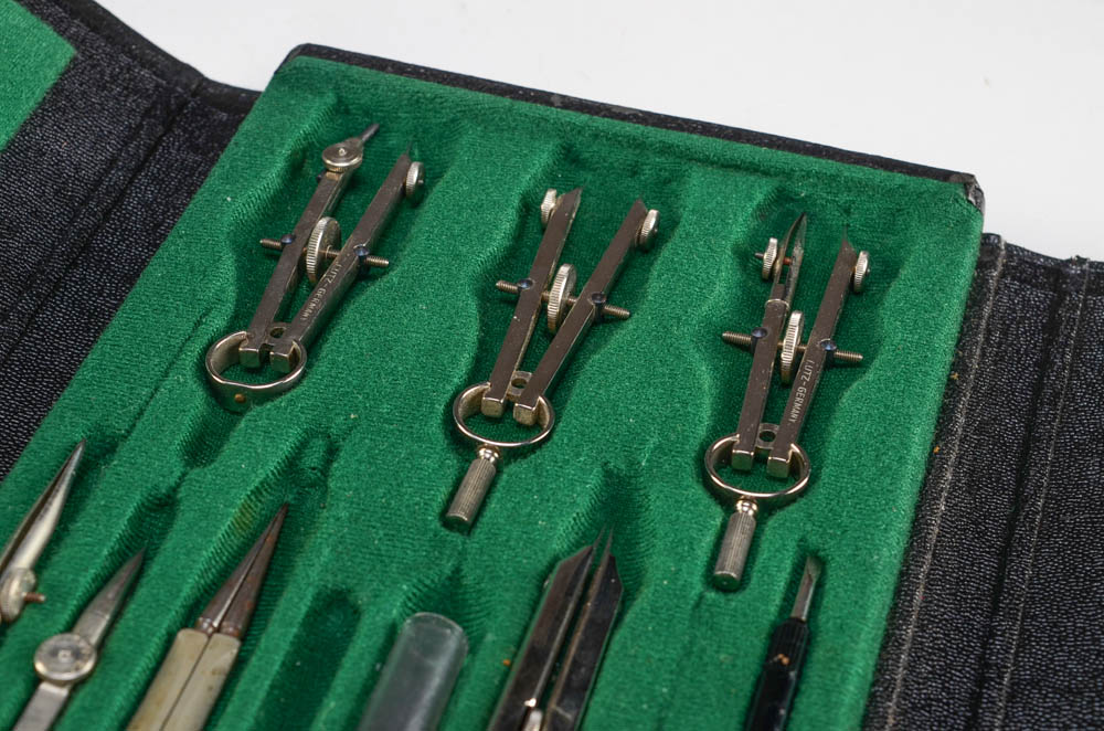 A Vintage "Empire" Typewriter and Drafting Tool Kits