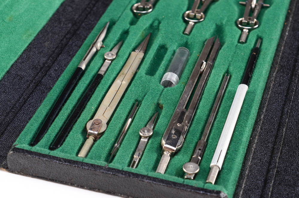 A Vintage "Empire" Typewriter and Drafting Tool Kits