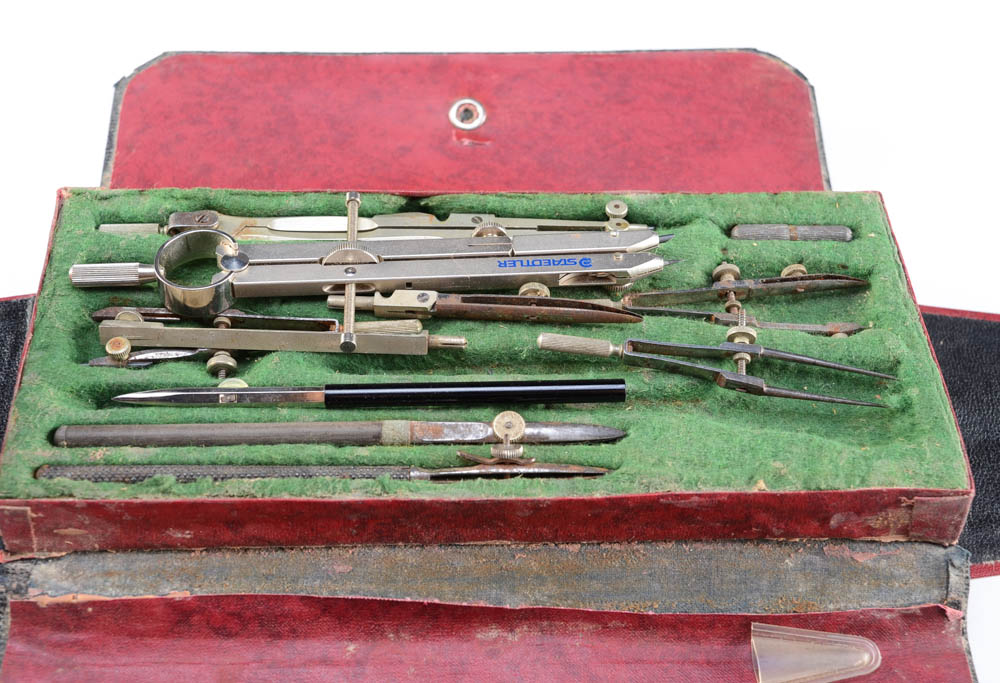 A Vintage "Empire" Typewriter and Drafting Tool Kits
