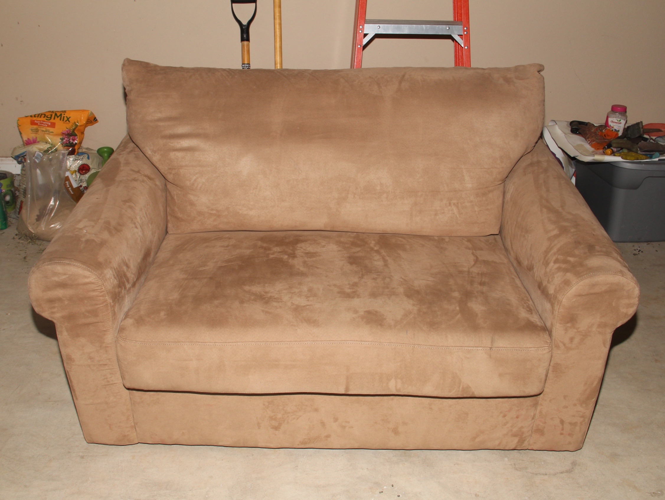 Beige Loveseat and Decorative Throw Pillows