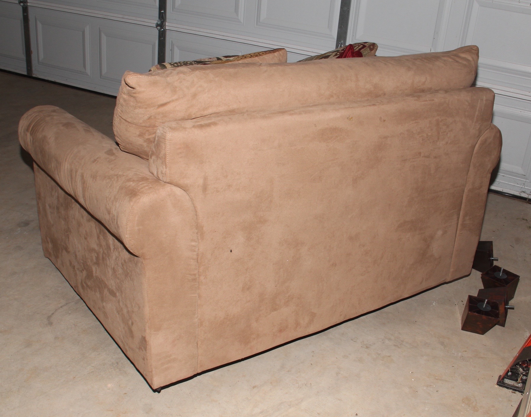 Beige Loveseat and Decorative Throw Pillows