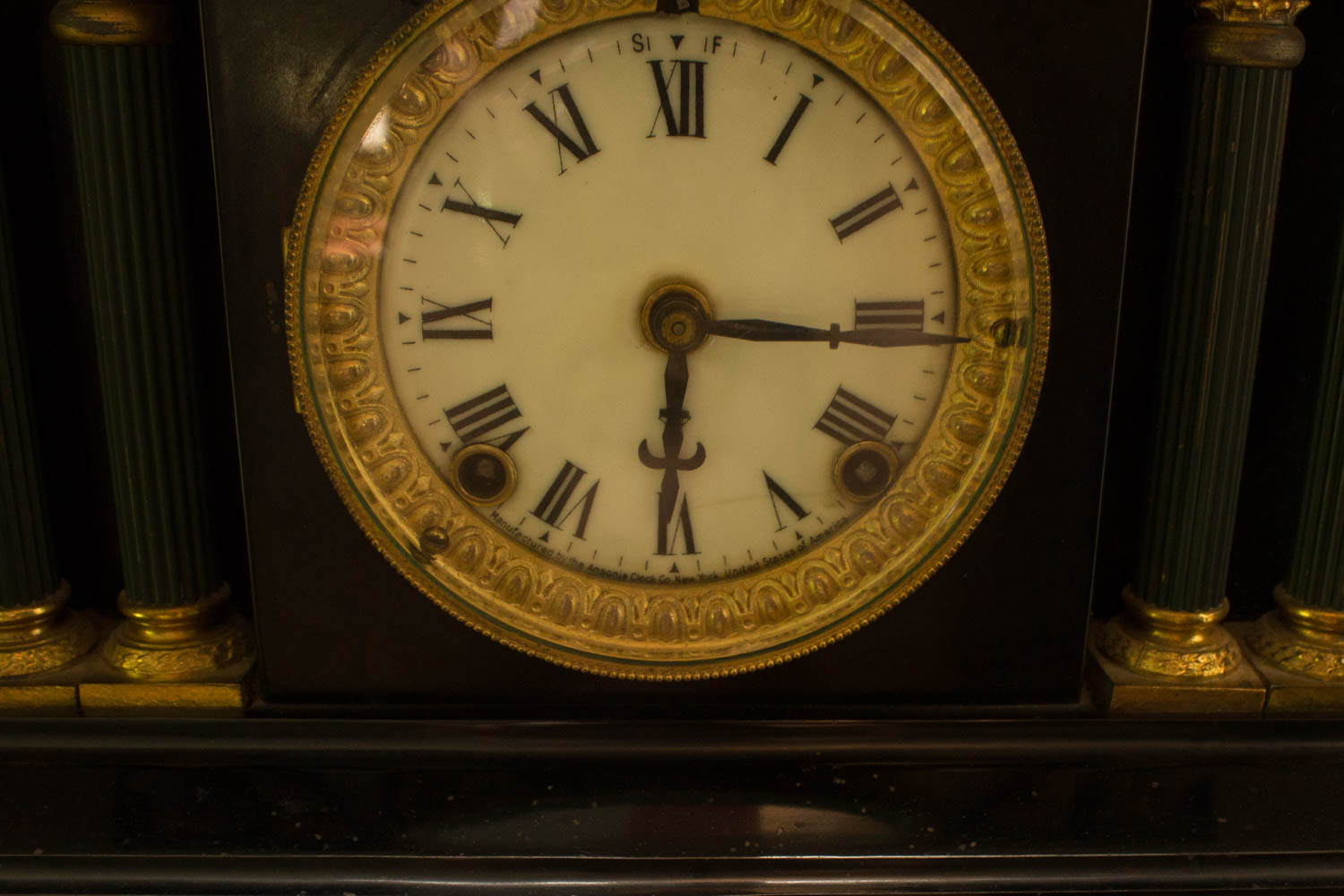 Antique Cast Iron Mantel Clock by The Ansonia Clock Company