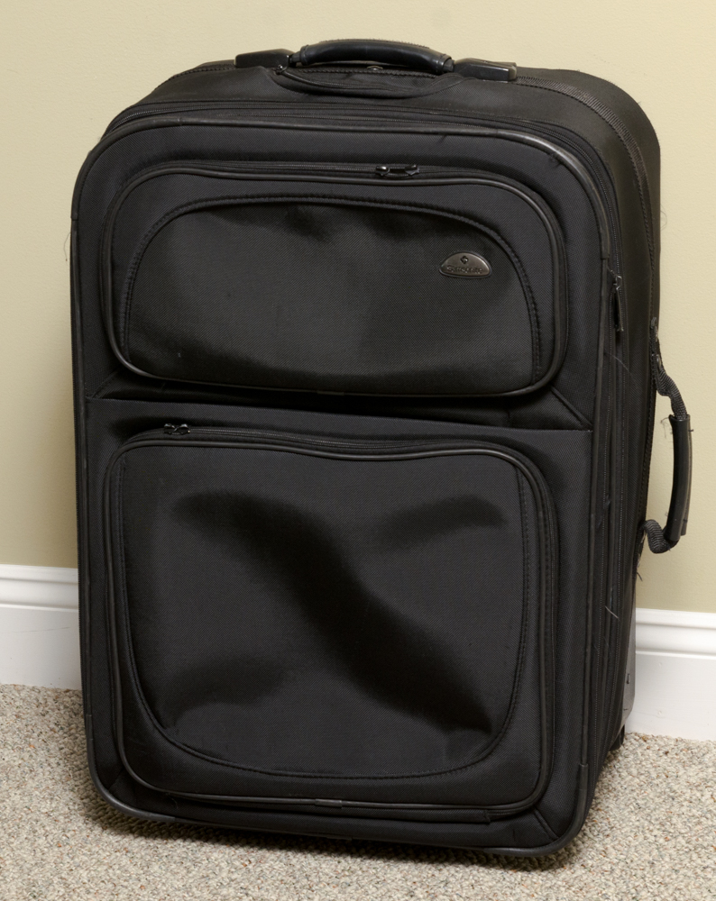 Collection of Samsonite  and Travelpro Suitcases