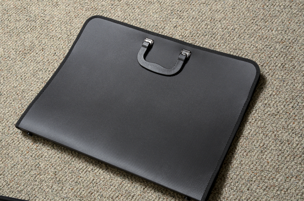 Collection of Art Supplies and Paper