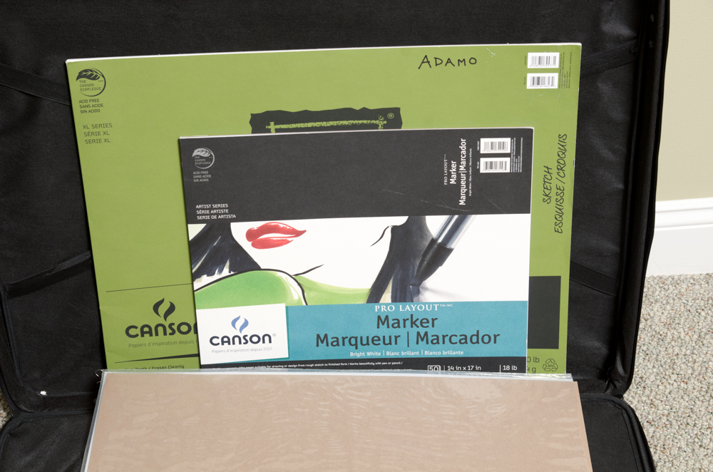 Collection of Art Supplies and Paper