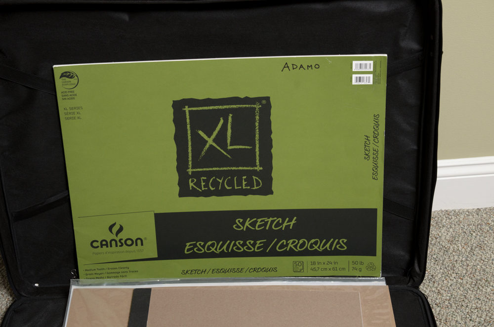 Collection of Art Supplies and Paper