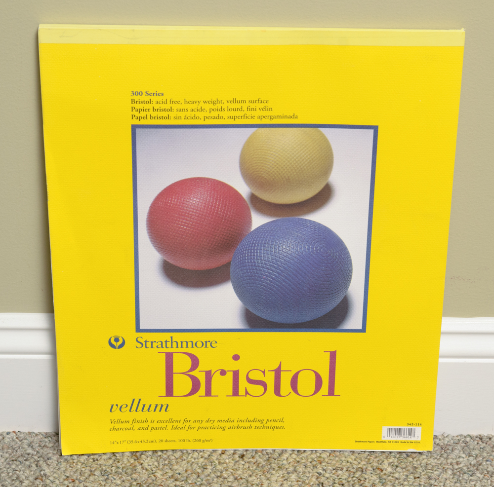 Collection of Art Supplies and Paper