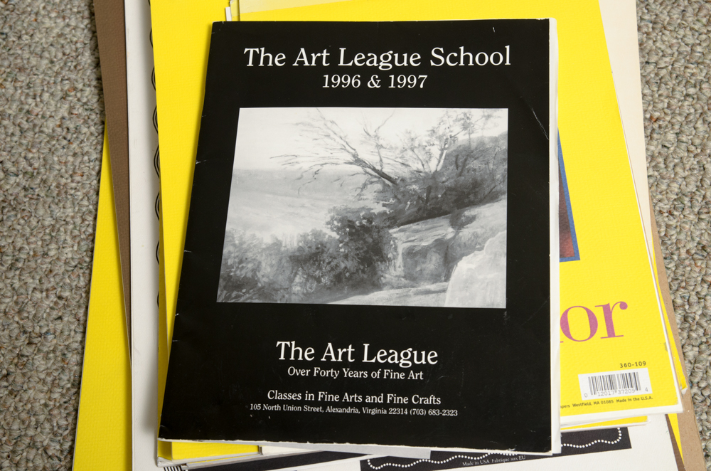 Collection of Art Supplies and Paper