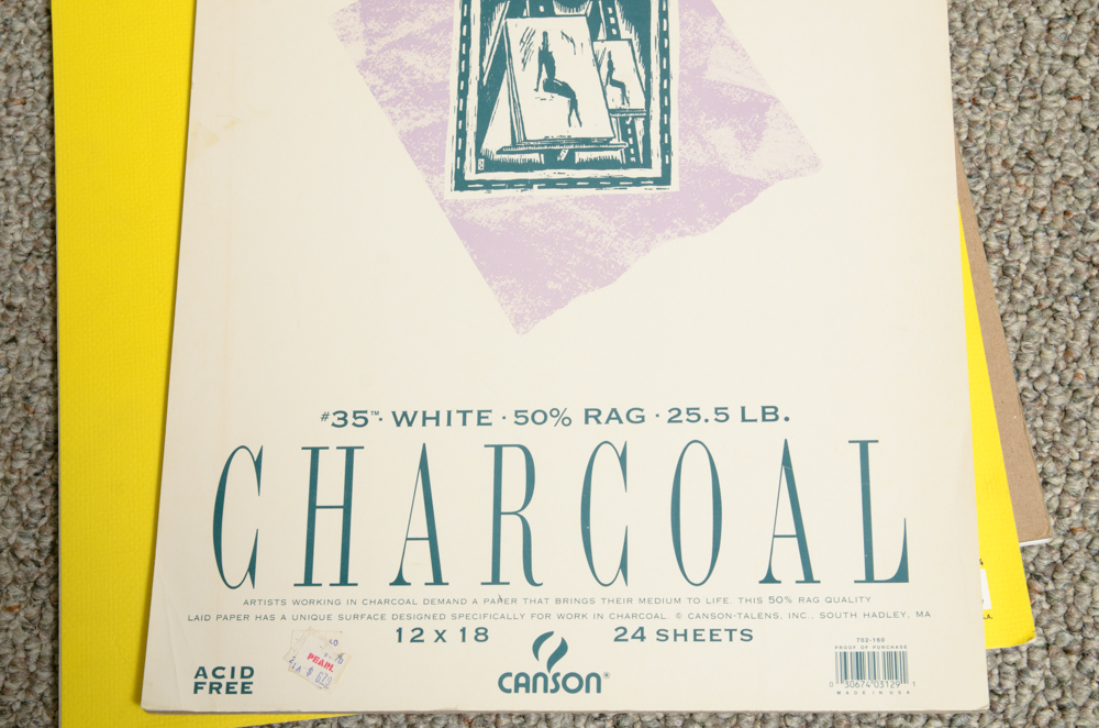 Collection of Art Supplies and Paper