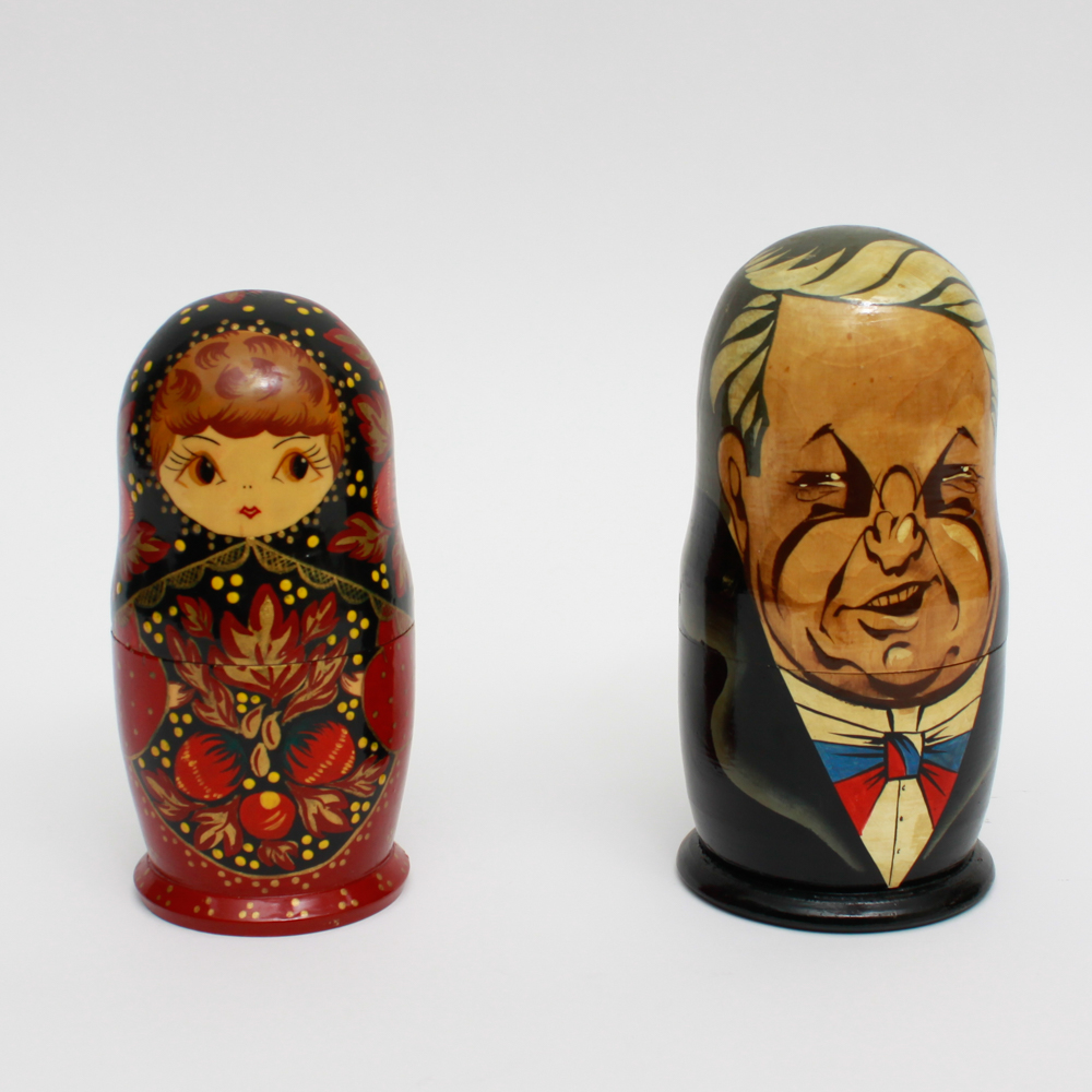 Pair of Hand Painted Russian Nesting Doll Sets