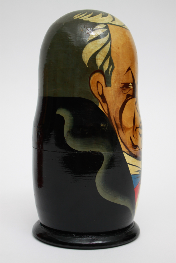 Pair of Hand Painted Russian Nesting Doll Sets