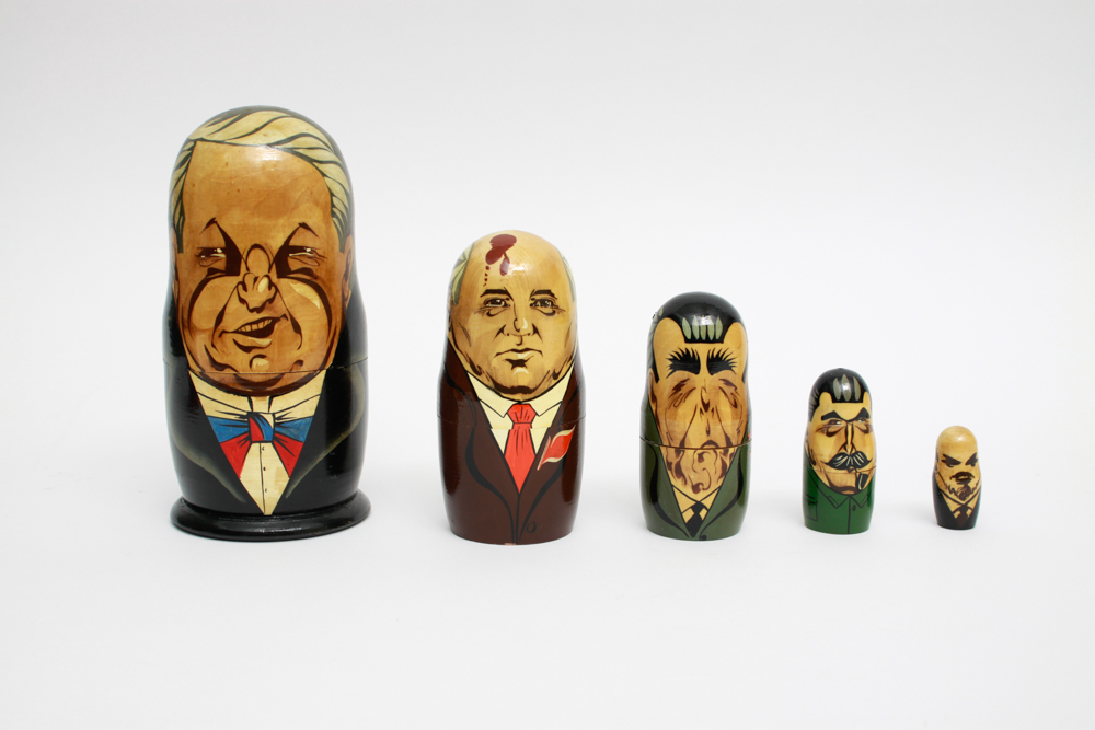 Pair of Hand Painted Russian Nesting Doll Sets