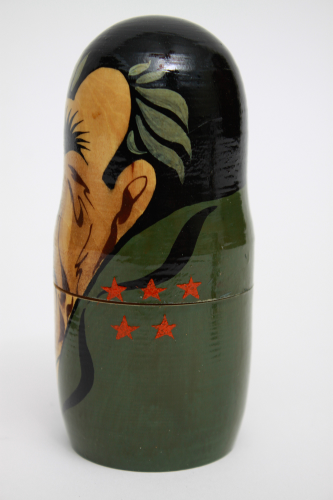 Pair of Hand Painted Russian Nesting Doll Sets