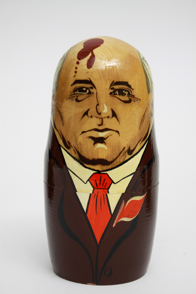 Pair of Hand Painted Russian Nesting Doll Sets