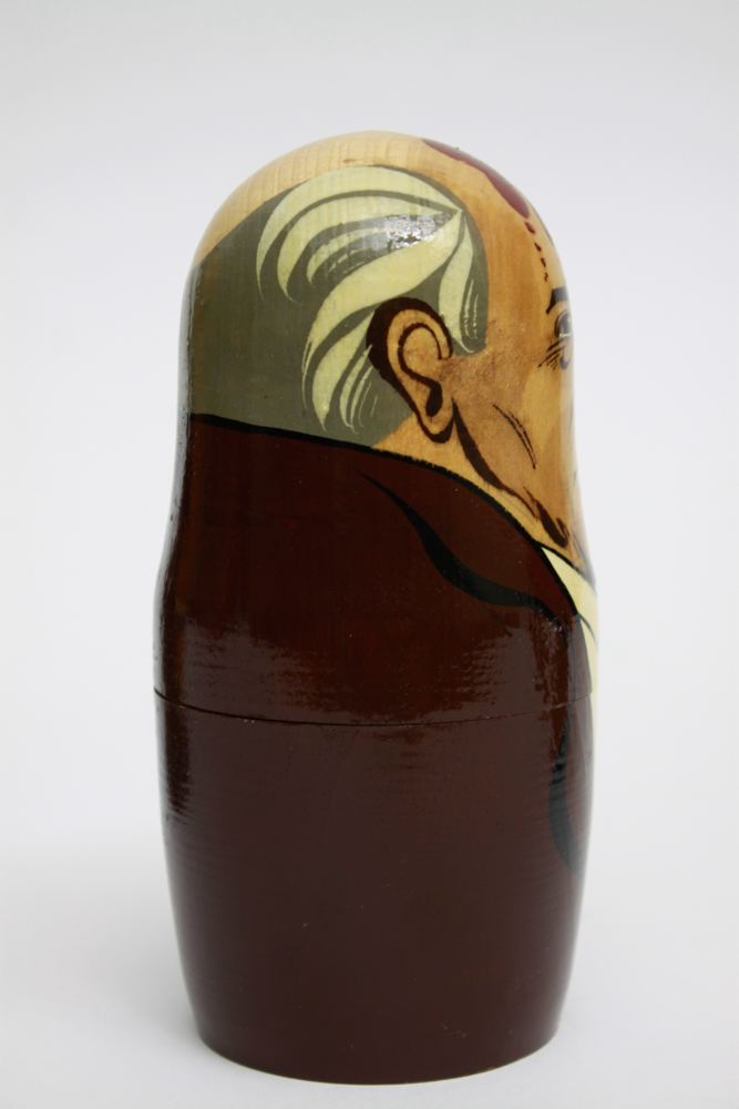 Pair of Hand Painted Russian Nesting Doll Sets