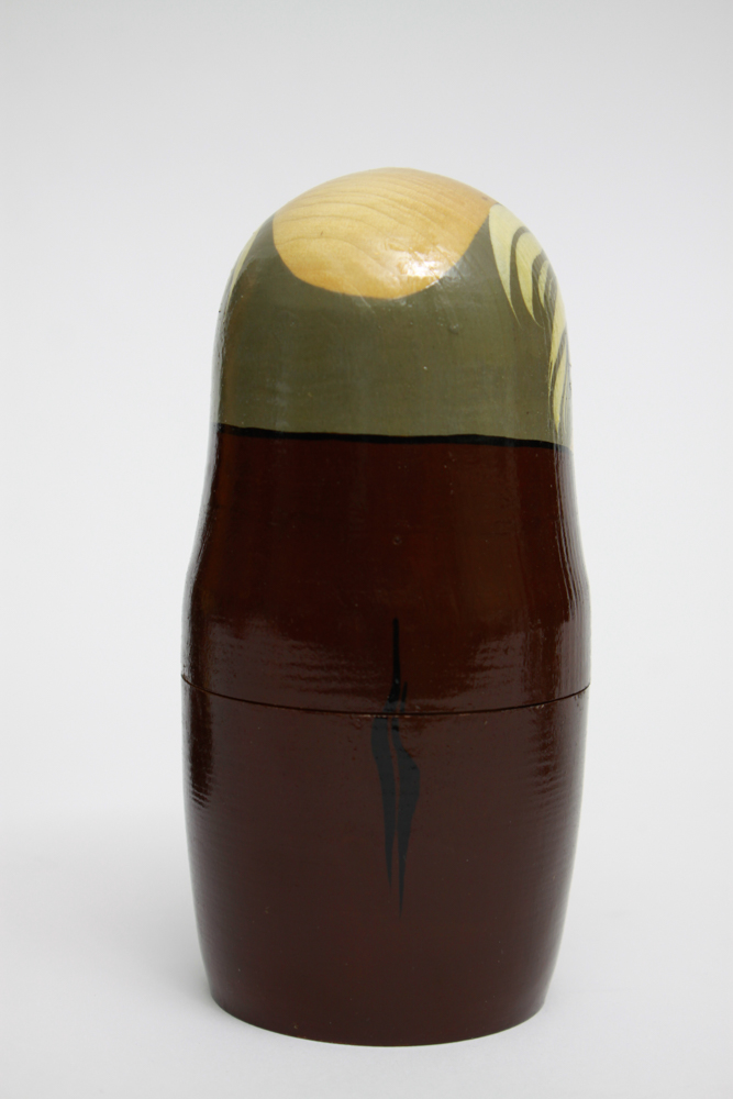 Pair of Hand Painted Russian Nesting Doll Sets