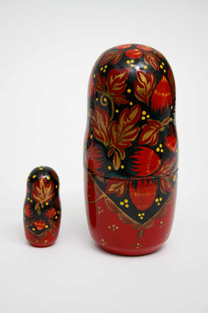 Pair of Hand Painted Russian Nesting Doll Sets