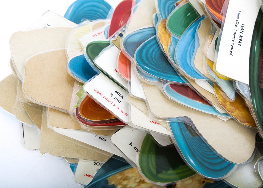 Vintage Homer Laughlin Fiesta "Go-Alongs" Tableware, Towel, and Laminated Paper Cut Outs