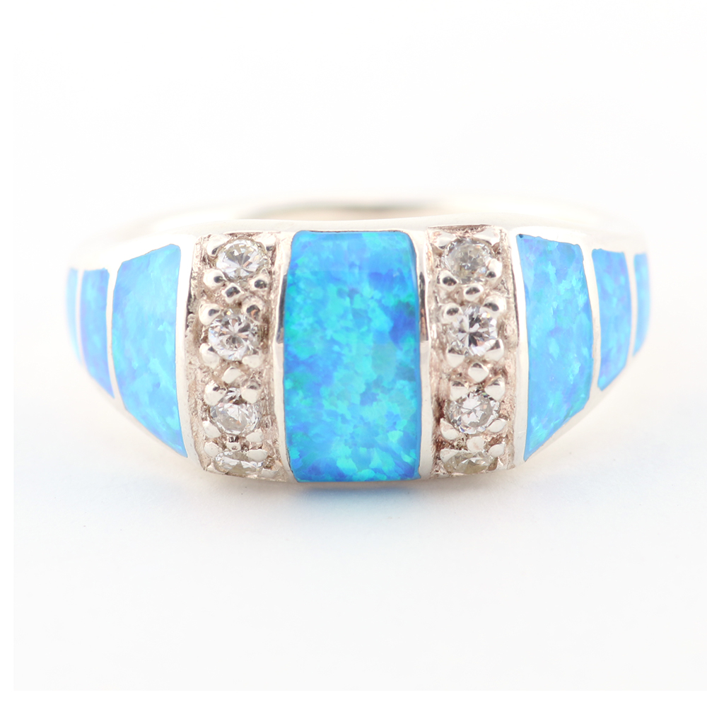 Sterling Silver Ring with White Stones and Synthetic Opal Inlay