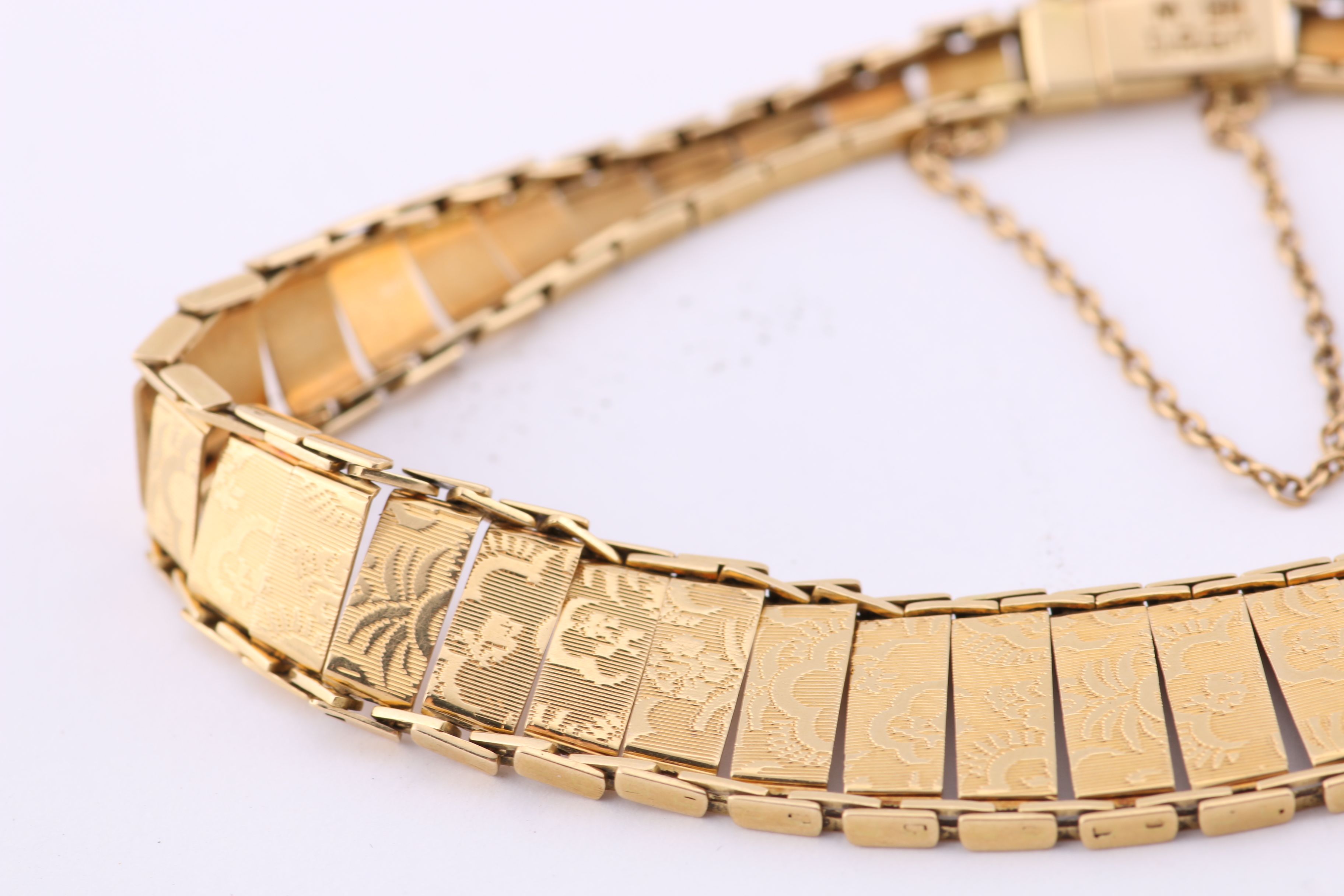 18K Yellow Gold Bracelet with Asian-Inspired Design