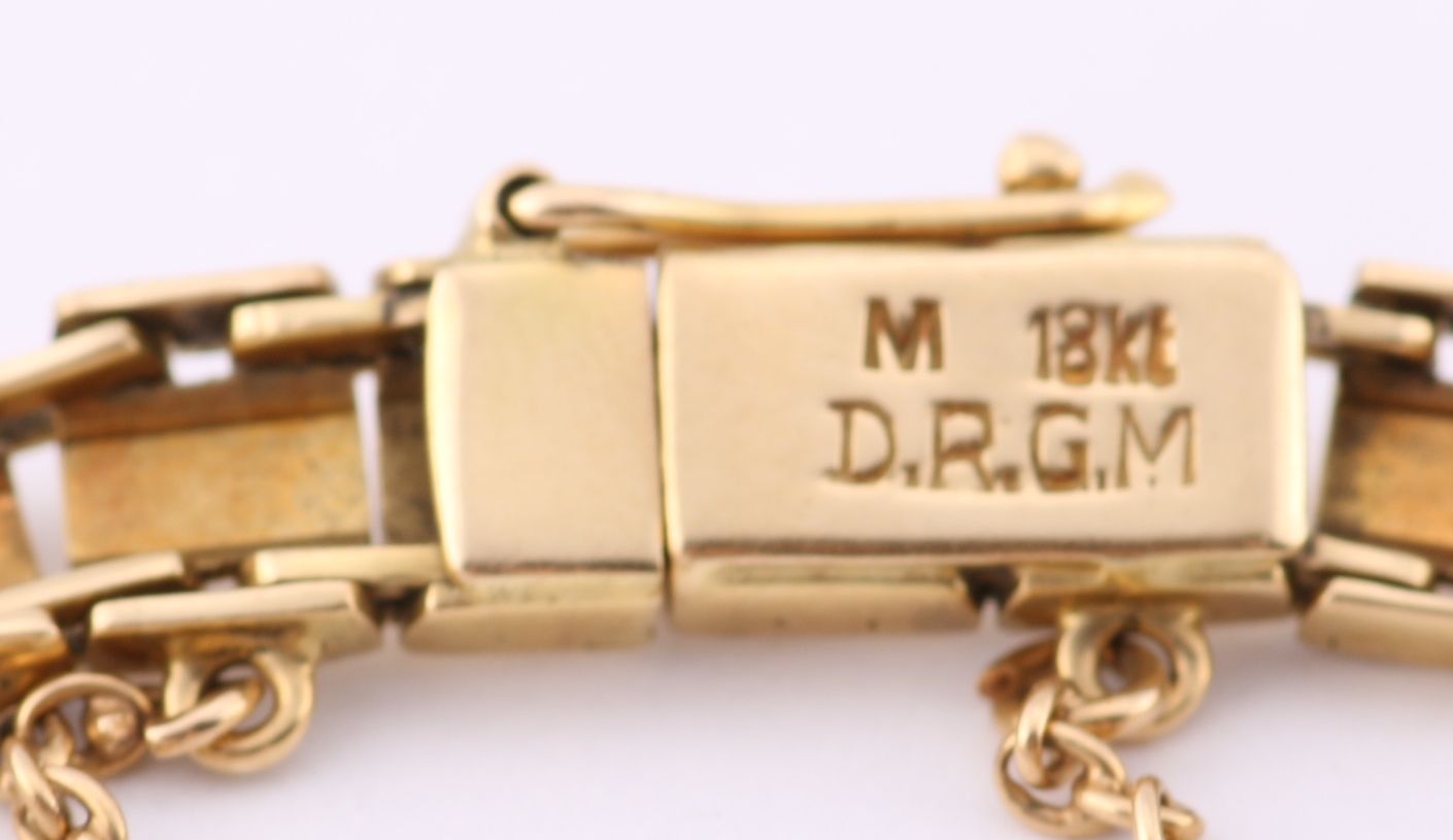 18K Yellow Gold Bracelet with Asian-Inspired Design