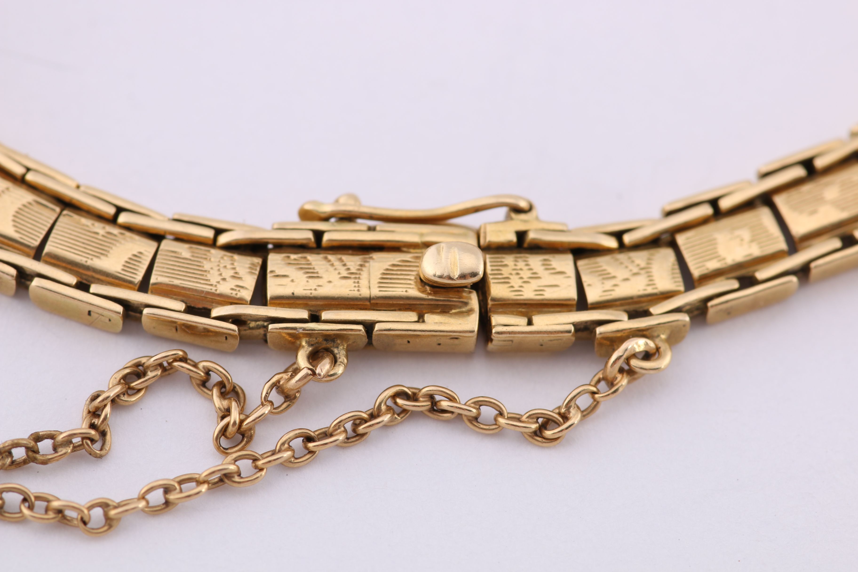 18K Yellow Gold Bracelet with Asian-Inspired Design