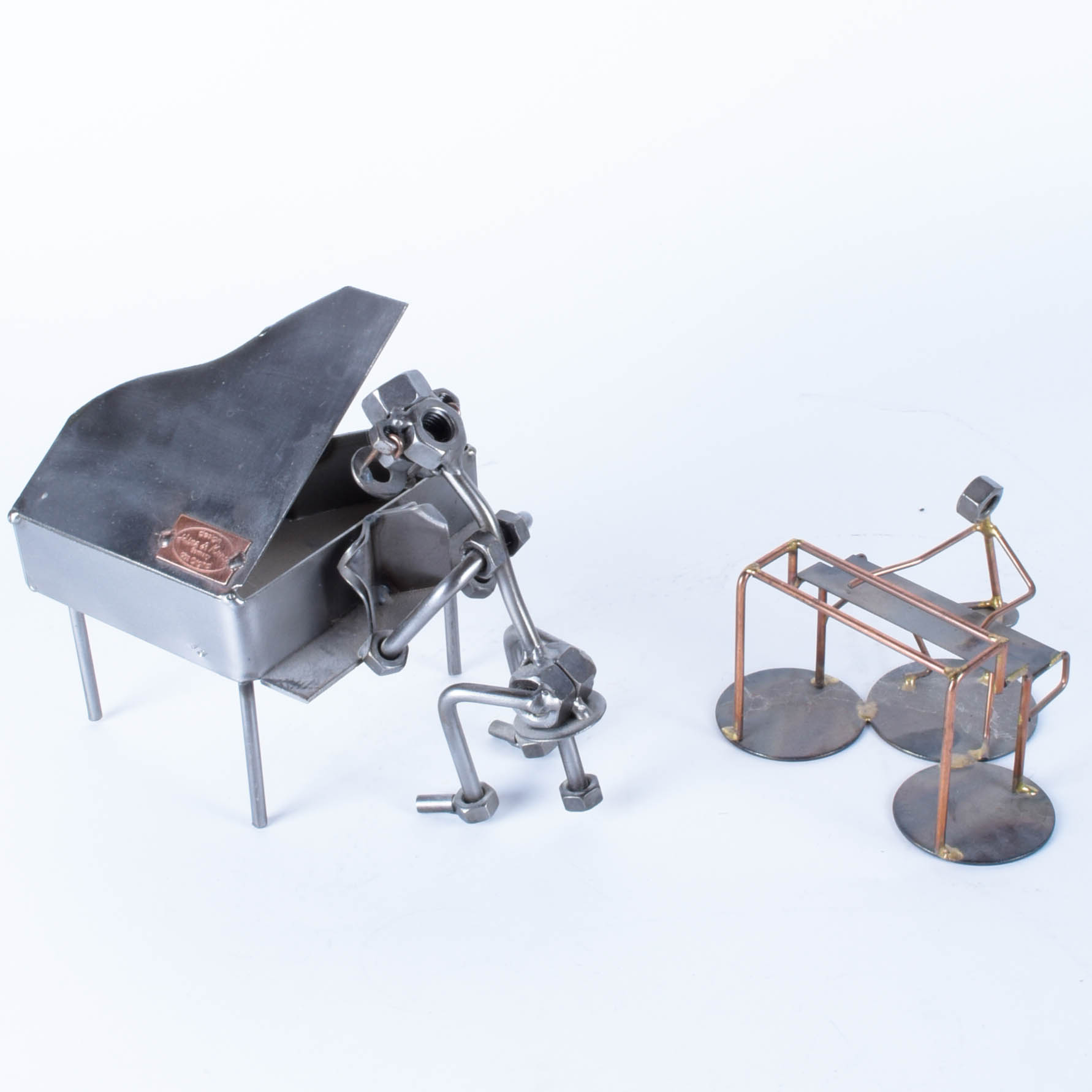 Pair of Hand-Crafted Metal Sculptures