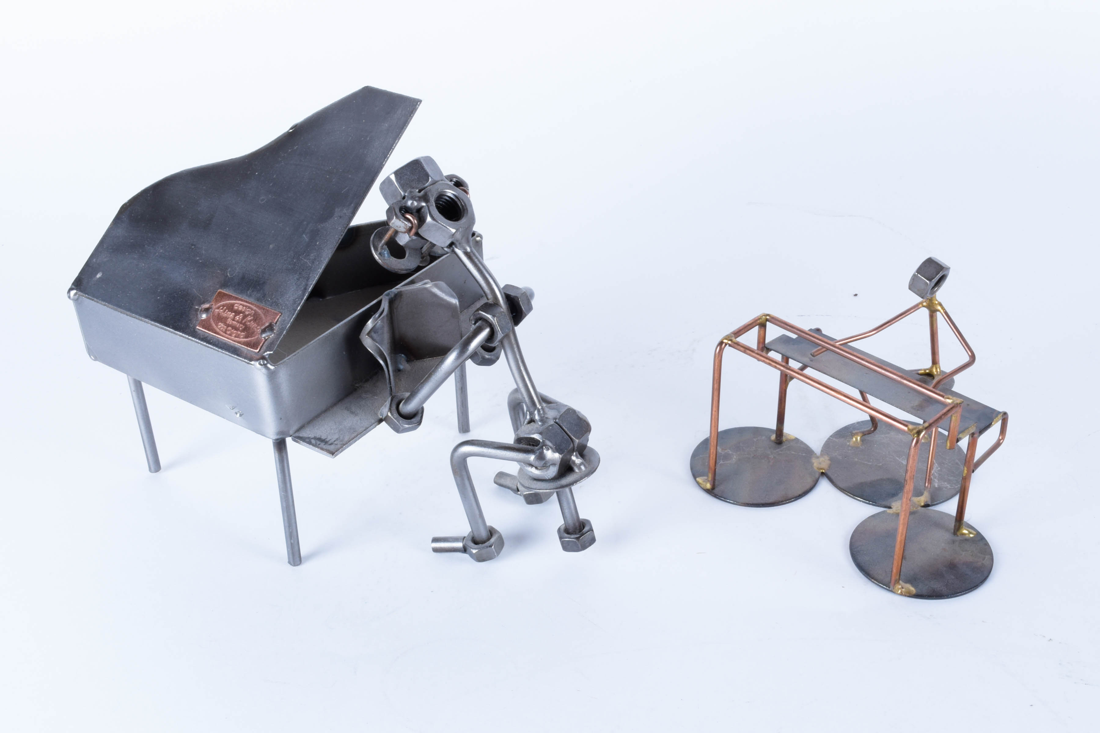 Pair of Hand-Crafted Metal Sculptures