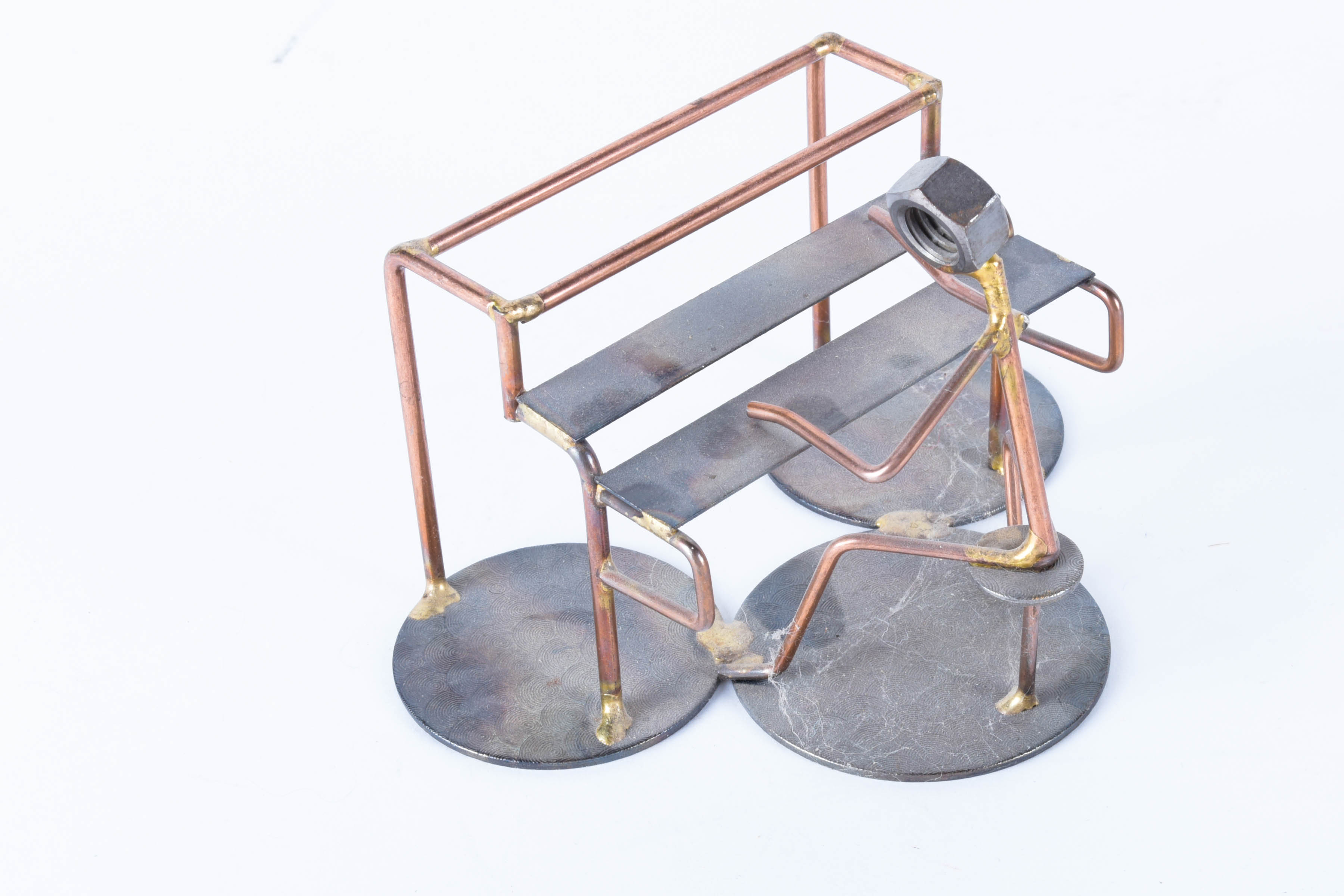 Pair of Hand-Crafted Metal Sculptures