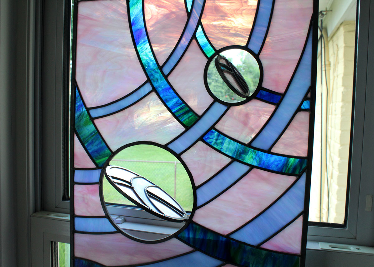 Stained Glass Window Pane with Rotating Discs