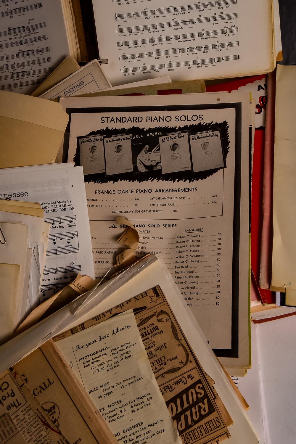 Collection of Vintage Sheet Music and Newspaper Clippings