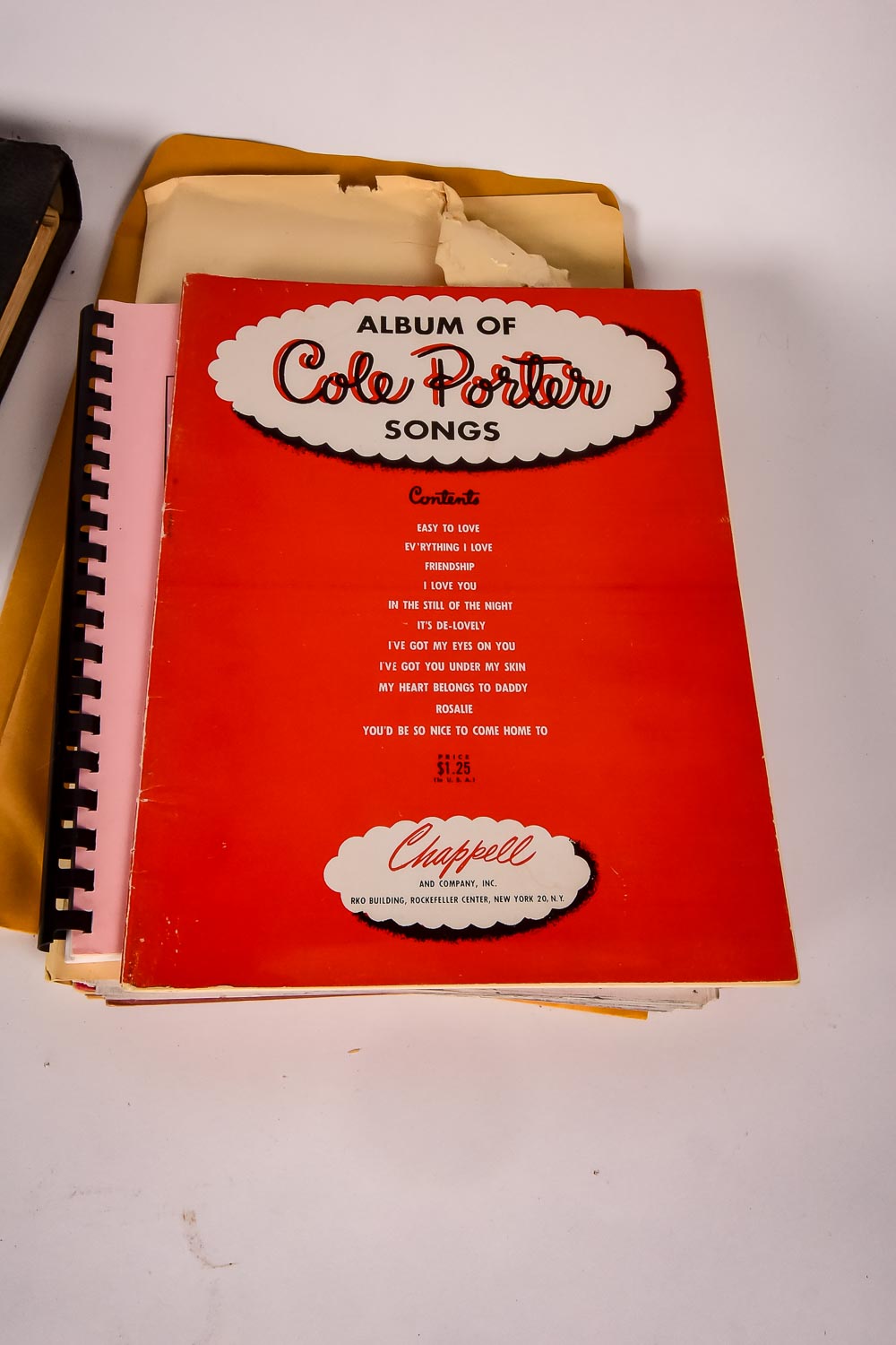 Collection of Vintage Sheet Music and Newspaper Clippings