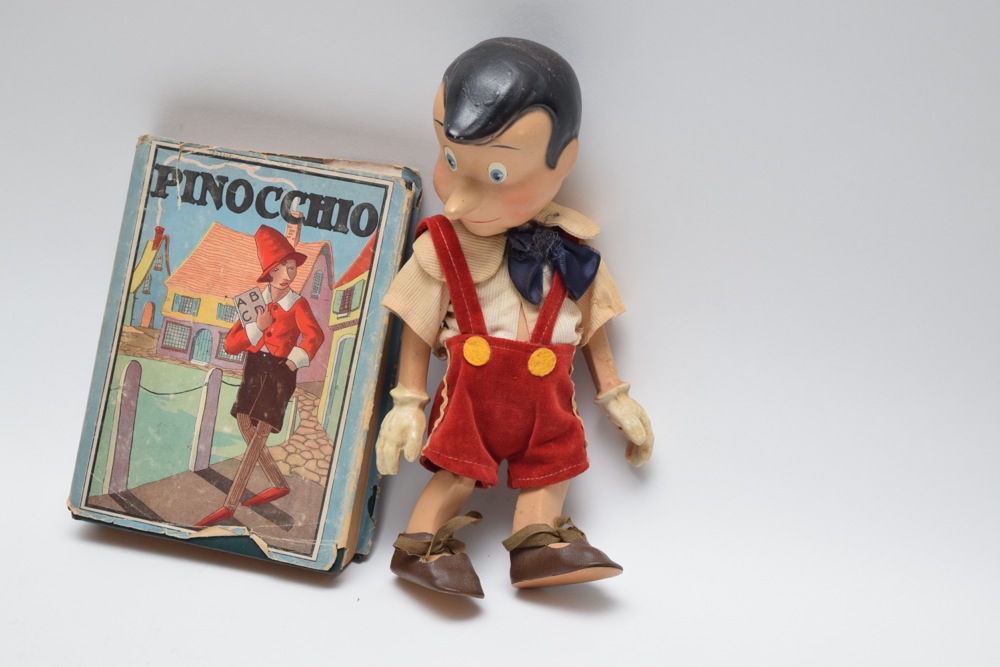 1930s Articulated Composite Disney Pinocchio Doll and First Edition 1916 Pinocchio Book