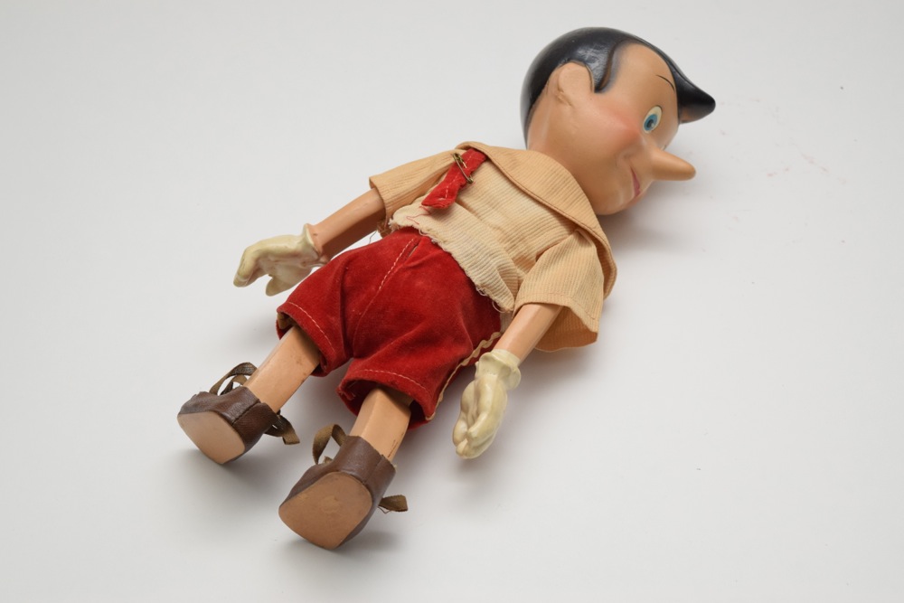 1930s Articulated Composite Disney Pinocchio Doll and First Edition 1916 Pinocchio Book