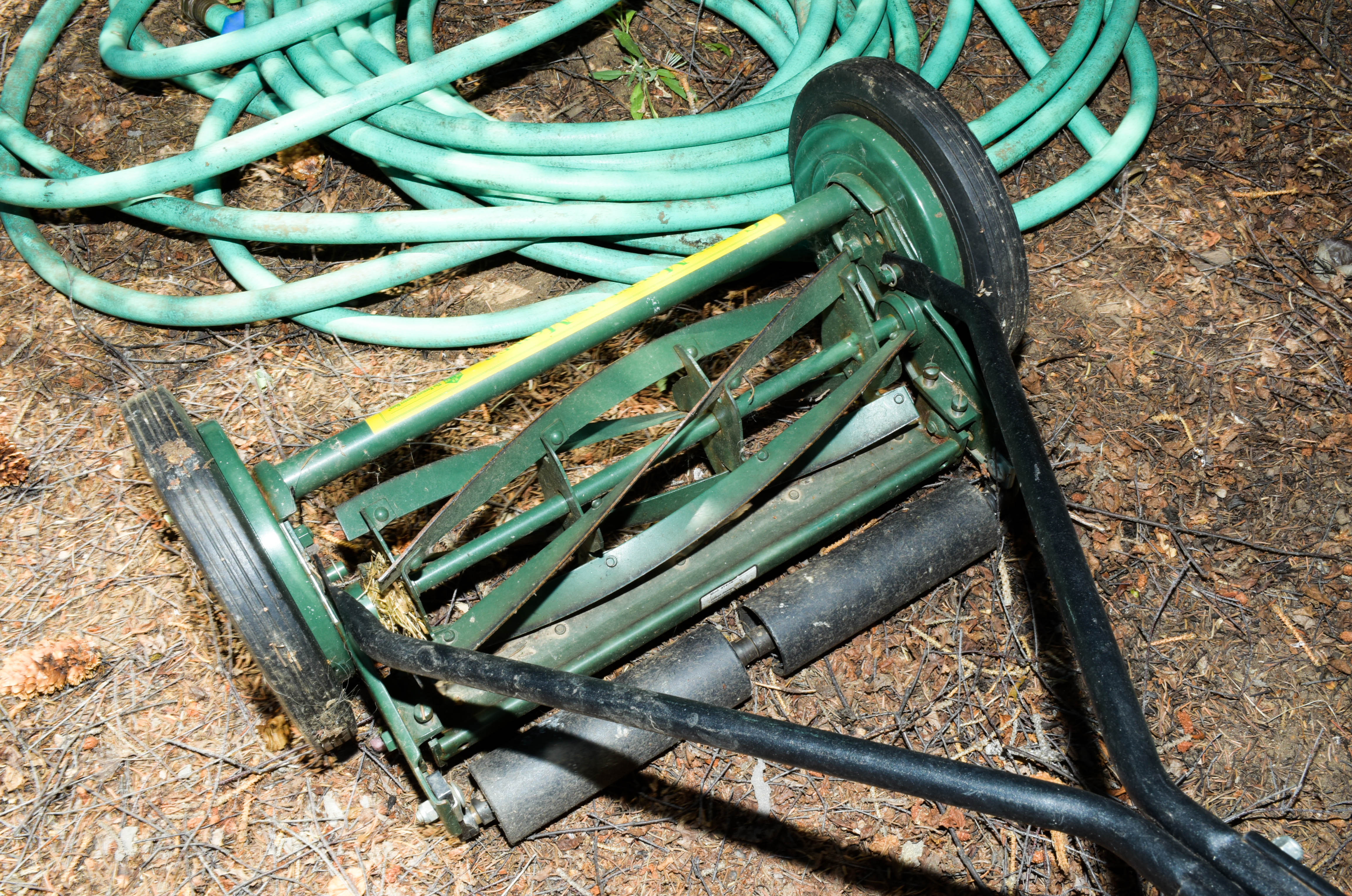 Green Push Mower and Yard Hose