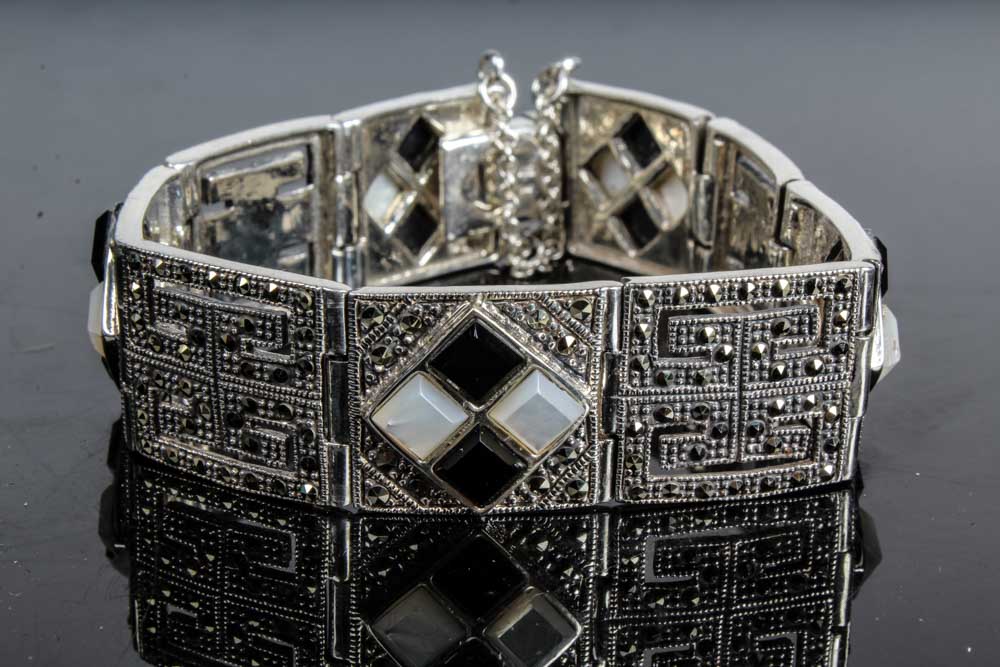 Two Sterling Silver Onyx and Mother of Pearl Bracelets