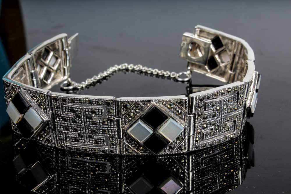 Two Sterling Silver Onyx and Mother of Pearl Bracelets