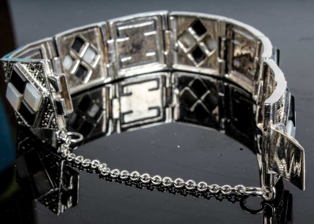 Two Sterling Silver Onyx and Mother of Pearl Bracelets