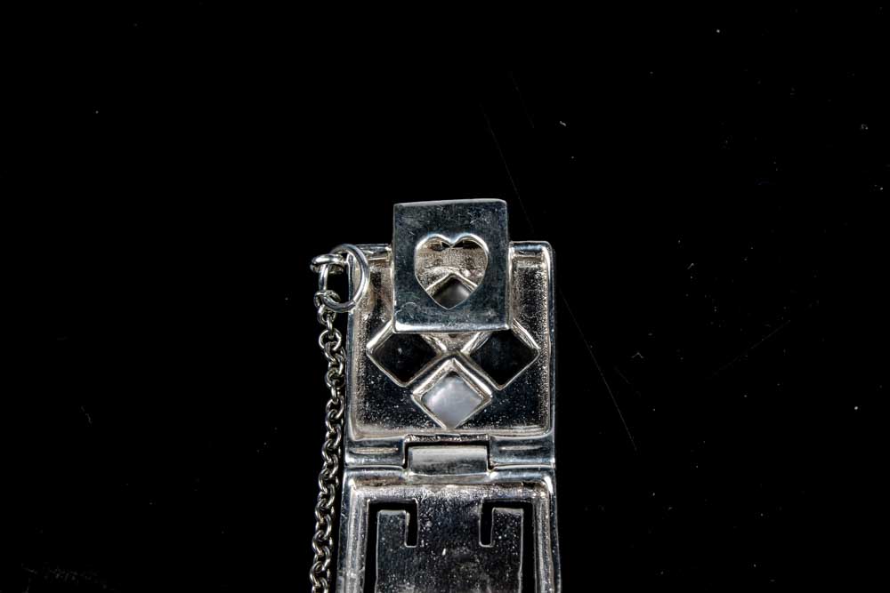 Two Sterling Silver Onyx and Mother of Pearl Bracelets