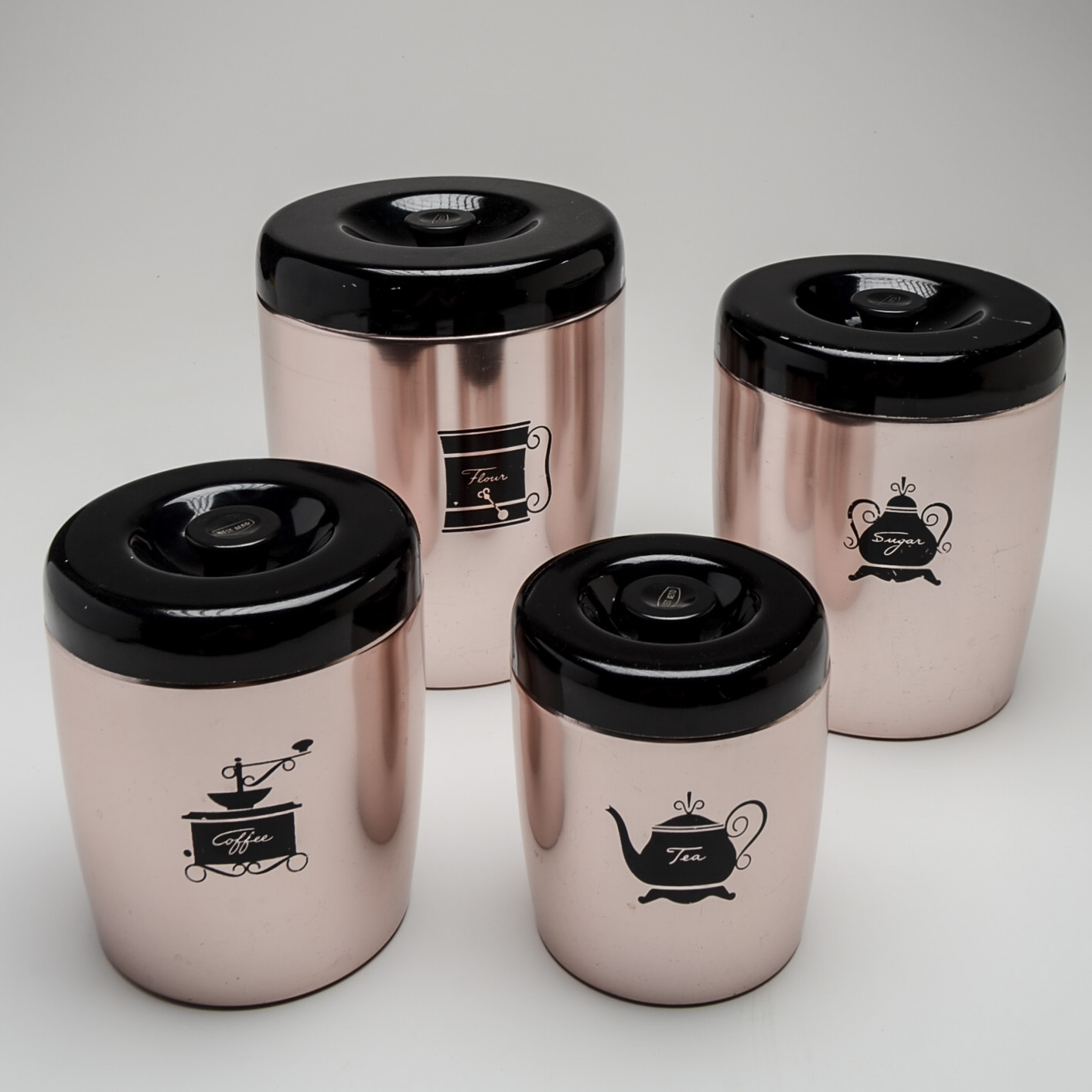 Vintage West Bend Aluminum Four-Piece Nesting Kitchen Canisters