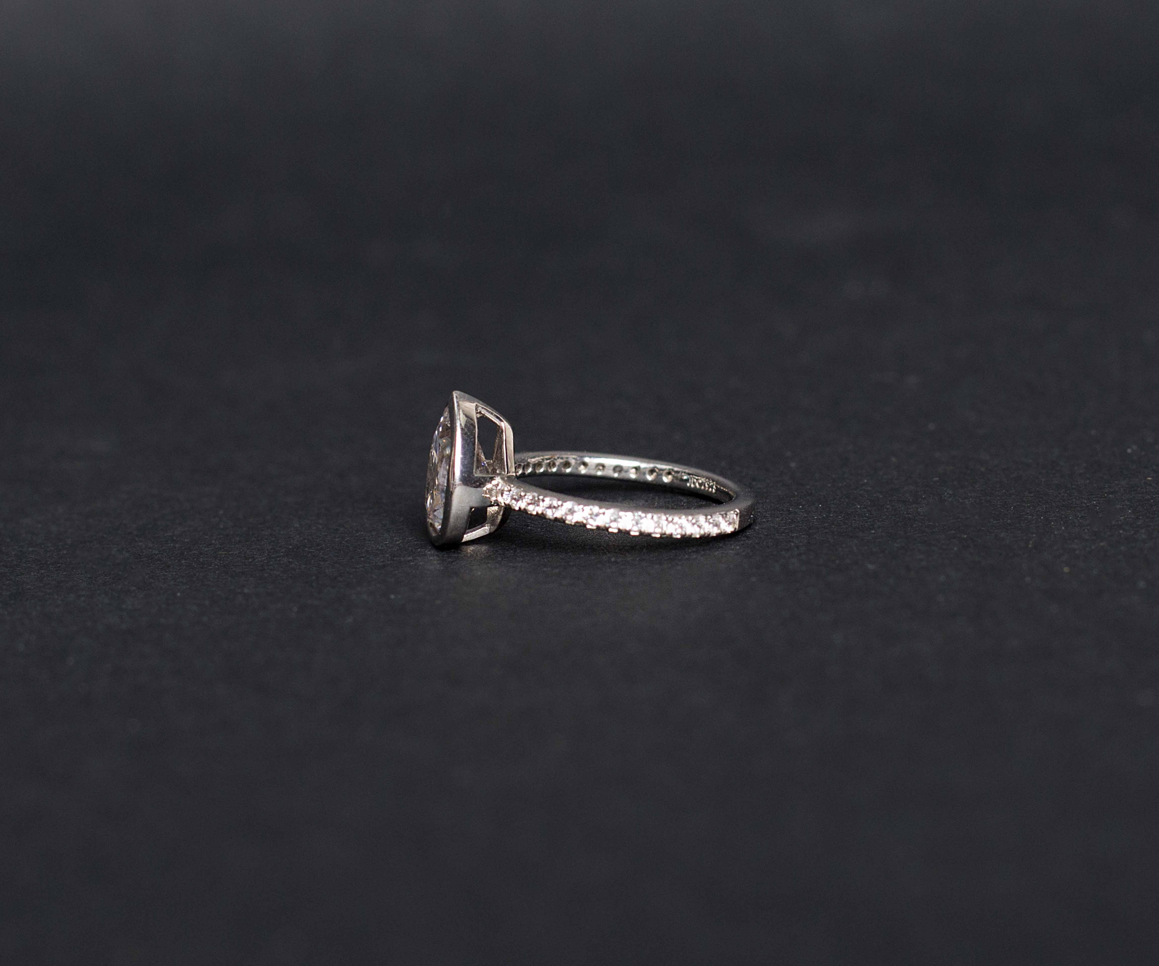 Sterling Silver Cubic Zirconia Channel Set Band and Pear Cut Stone